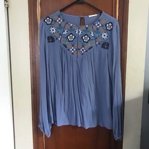 Blue blouse with floral embroidery